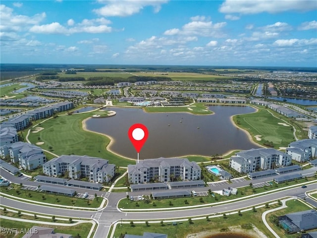 5583 Double Eagle Cir Unit 4141, Ave Maria, FL 34142 - aerial view of a large body of water and a local golf course