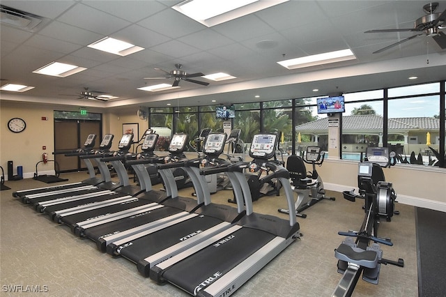 3880 Sawgrass Way Unit 2423, Naples, FL 34112 - workout area featuring a ceiling fan, a paneled ceiling, baseboards, and carpet floors