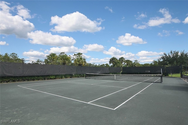 3880 Sawgrass Way Unit 2423, Naples, FL 34112 - view of tennis court featuring fence and community basketball court