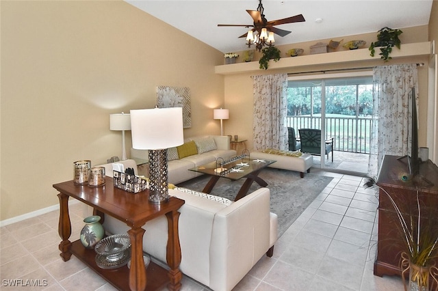 3880 Sawgrass Way Unit 2423, Naples, FL 34112 - living room with a ceiling fan, light tile patterned floors, lofted ceiling, and baseboards