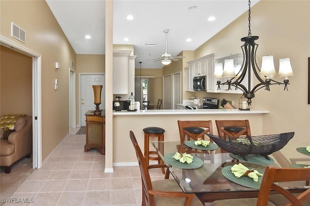 3880 Sawgrass Way Unit 2423, Naples, FL 34112 - kitchen with stainless steel appliances, white cabinetry, recessed lighting, a ceiling fan, and pendant lighting