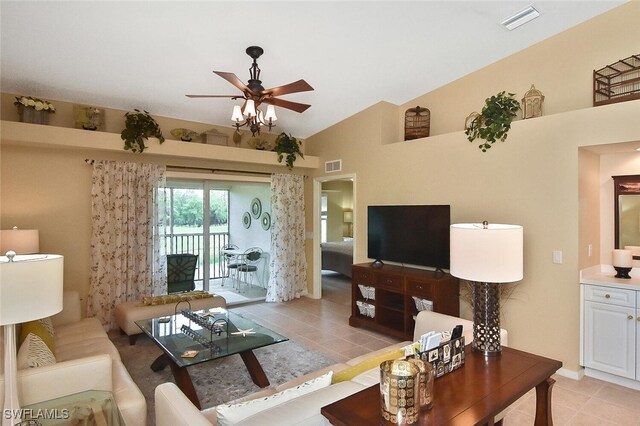 3880 Sawgrass Way Unit 2423, Naples, FL 34112 - living room featuring a ceiling fan, light tile patterned floors, and vaulted ceiling