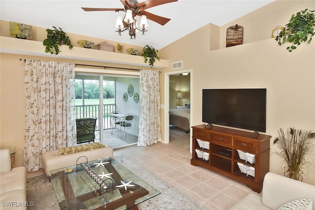 3880 Sawgrass Way Unit 2423, Naples, FL 34112 - living area featuring a ceiling fan, light tile patterned floors, and vaulted ceiling