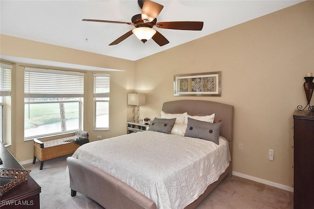 3880 Sawgrass Way Unit 2423, Naples, FL 34112 - bedroom featuring light colored carpet, baseboards, a ceiling fan, and lofted ceiling