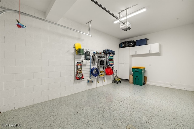 2647 Seychelles Cir Unit 2203, Naples, FL 34112 - garage featuring a garage door opener