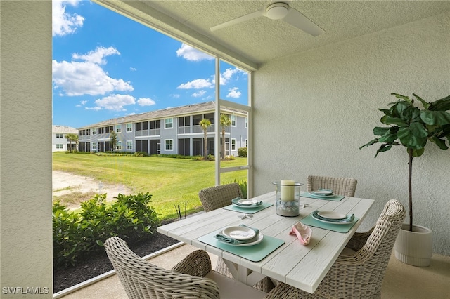 2647 Seychelles Cir Unit 2203, Naples, FL 34112 - sunroom / solarium featuring ceiling fan and outdoor dining space