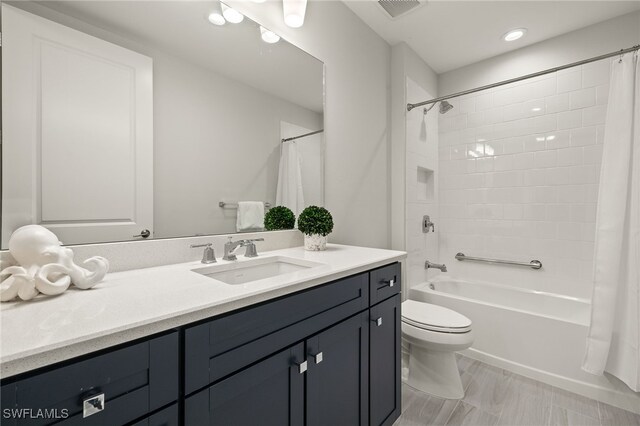 2647 Seychelles Cir Unit 2203, Naples, FL 34112 - bathroom with shower / bath combo, vanity, and toilet