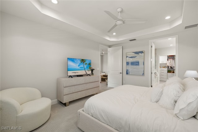 2647 Seychelles Cir Unit 2203, Naples, FL 34112 - bedroom featuring recessed lighting, a tray ceiling, light carpet, baseboards, and a ceiling fan