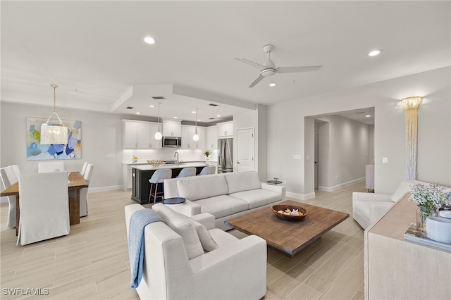 2647 Seychelles Cir Unit 2203, Naples, FL 34112 - living area with light wood-style floors, ceiling fan, baseboards, and recessed lighting