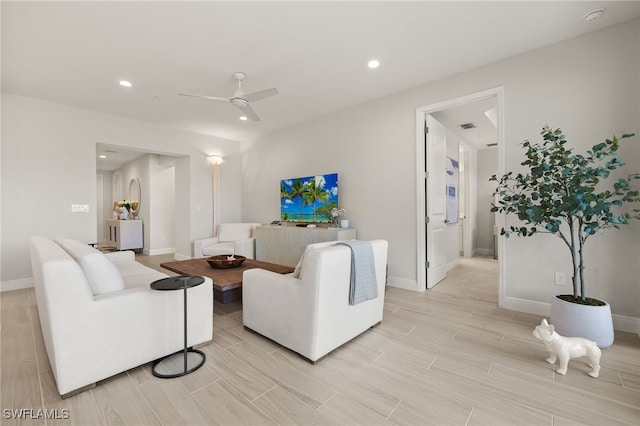 2647 Seychelles Cir Unit 2203, Naples, FL 34112 - living room featuring ceiling fan, light wood-style floors, recessed lighting, and baseboards