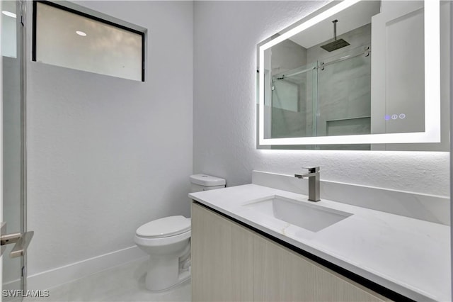 3366 72nd Ave NE, Naples, FL 34120 - full bath featuring a shower stall, toilet, vanity, and a textured wall