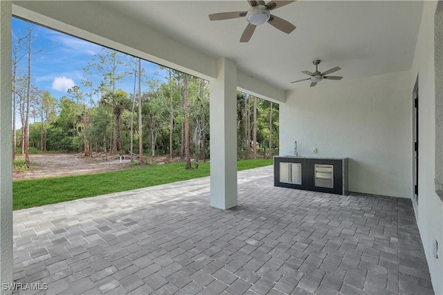 3366 72nd Ave NE, Naples, FL 34120 - view of patio with a ceiling fan, area for grilling, and a sink