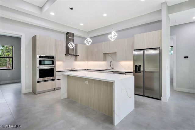 3366 72nd Ave NE, Naples, FL 34120 - kitchen featuring stainless steel appliances, modern cabinets, wall chimney range hood, a center island, and a sink