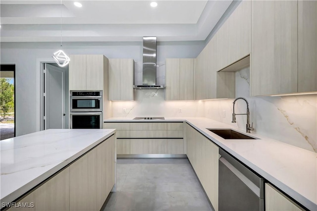 3366 72nd Ave NE, Naples, FL 34120 - kitchen featuring wall chimney exhaust hood, a sink, modern cabinets, appliances with stainless steel finishes, and recessed lighting