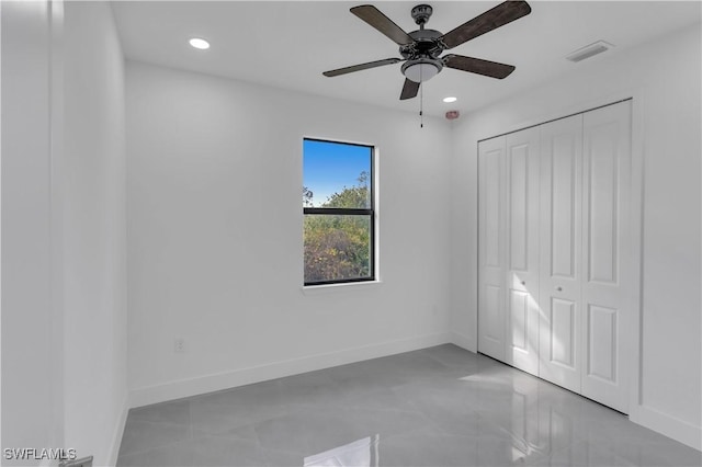 1005 State Ave, Lehigh Acres, FL 33972 - unfurnished bedroom featuring recessed lighting, a closet, and a ceiling fan