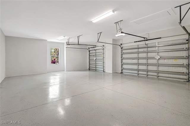 3390 12th Ave SE, Naples, FL 34117 - garage featuring a garage door opener