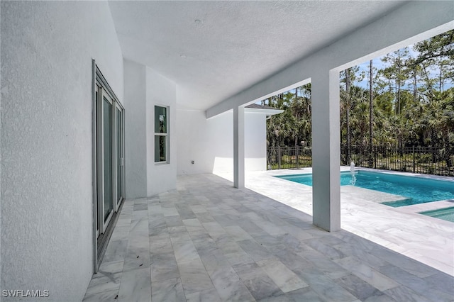3390 12th Ave SE, Naples, FL 34117 - view of pool featuring a patio and fence