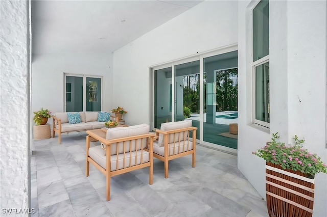 3390 12th Ave SE, Naples, FL 34117 - view of patio / terrace with an outdoor hangout area