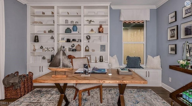 mudroom featuring wood finished floors, baseboards, and crown molding