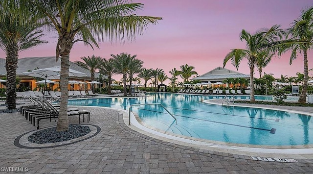 community pool featuring a patio area
