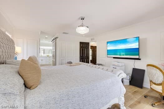 914 Albert Ave, Lehigh Acres, FL 33971 - bedroom featuring light wood-style flooring