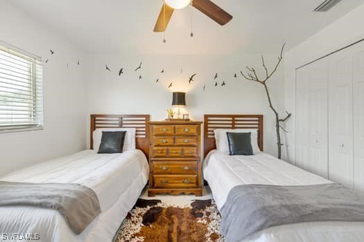 914 Albert Ave, Lehigh Acres, FL 33971 - bedroom with a closet and ceiling fan