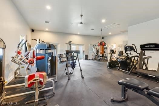 914 Albert Ave, Lehigh Acres, FL 33971 - exercise room with recessed lighting and healthy amount of natural light