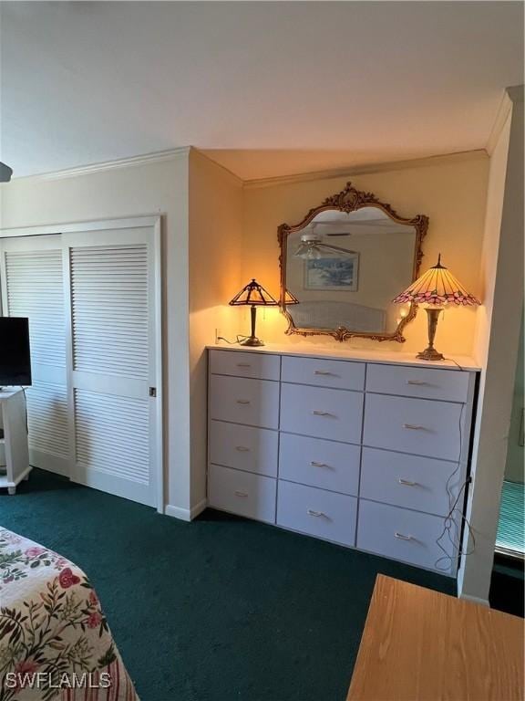 7731 Bocilla Ln Unit 9, Bokeelia, FL 33922 - bedroom featuring dark carpet and ornamental molding