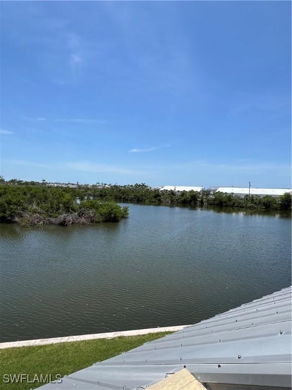 7731 Bocilla Ln Unit 9, Bokeelia, FL 33922 - dock featuring a water view
