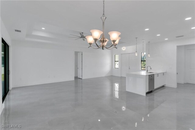 3604 Flora Ave N, Lehigh Acres, FL 33971 - kitchen with a sink, stainless steel dishwasher, light countertops, white cabinetry, and a chandelier