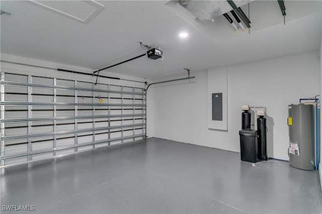 3107 33rd St W, Lehigh Acres, FL 33971 - garage with water heater, a garage door opener, and electric panel