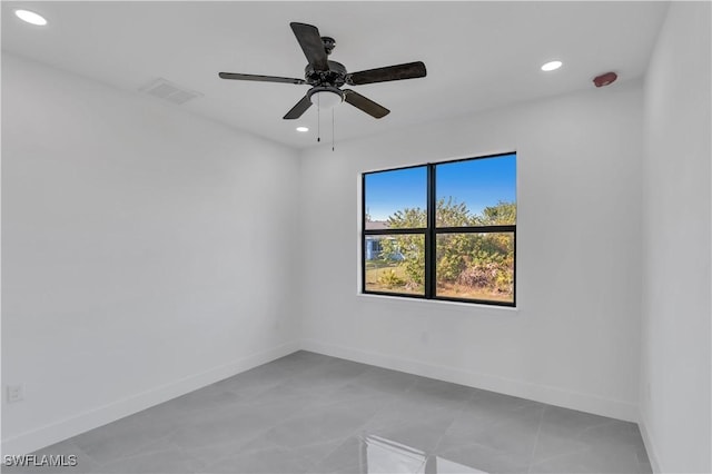 3107 33rd St W, Lehigh Acres, FL 33971 - spare room with recessed lighting, baseboards, a ceiling fan, and light tile patterned floors