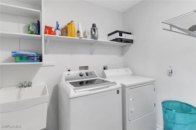 120 Heritage Way, Naples, FL 34110 - laundry area with separate washer and dryer