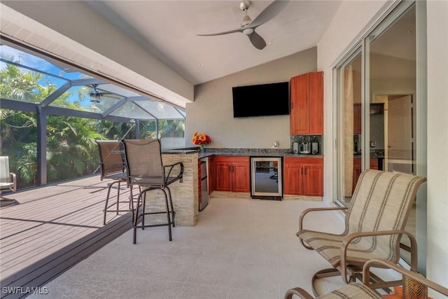 120 Heritage Way, Naples, FL 34110 - view of patio with wine cooler, area for grilling, a lanai, and a ceiling fan