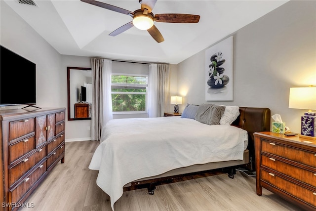 120 Heritage Way, Naples, FL 34110 - bedroom with light wood-style flooring, a ceiling fan, and baseboards