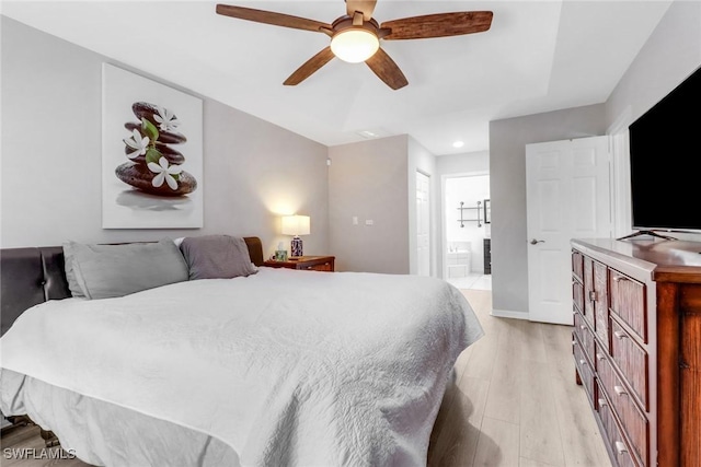 120 Heritage Way, Naples, FL 34110 - bedroom featuring light wood-style flooring, connected bathroom, recessed lighting, and a ceiling fan