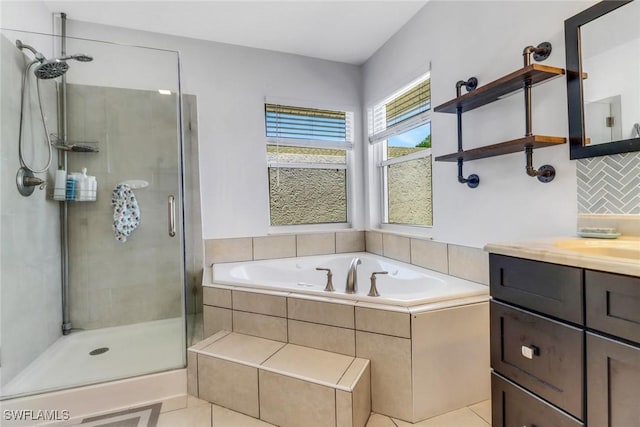 120 Heritage Way, Naples, FL 34110 - bathroom featuring a shower stall, a bath, vanity, and tile patterned floors