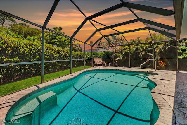 120 Heritage Way, Naples, FL 34110 - outdoor pool featuring a patio area and glass enclosure