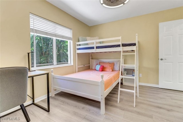 120 Heritage Way, Naples, FL 34110 - bedroom featuring light wood-style floors and baseboards