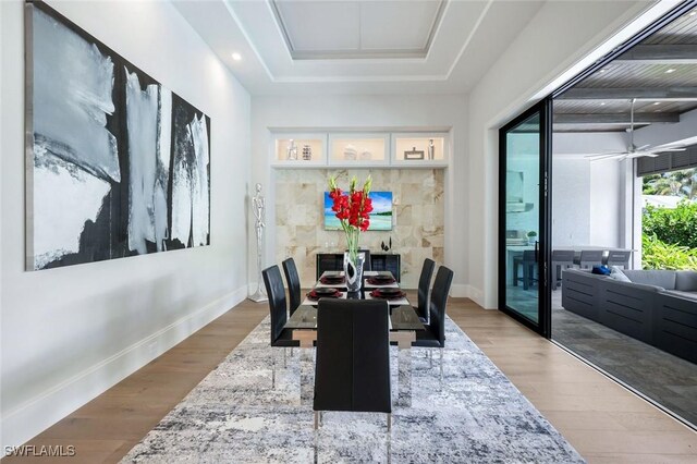 541 Whispering Pine Ct, Naples, FL 34103 - dining space featuring baseboards and wood finished floors
