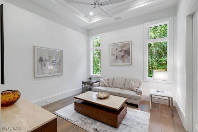 541 Whispering Pine Ct, Naples, FL 34103 - living area featuring ceiling fan, light wood finished floors, beamed ceiling, baseboards, and coffered ceiling