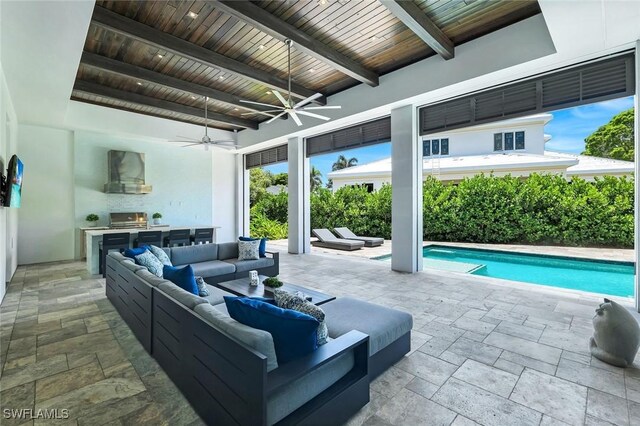 541 Whispering Pine Ct, Naples, FL 34103 - view of patio / terrace featuring an outdoor hangout area, a ceiling fan, and an outdoor pool
