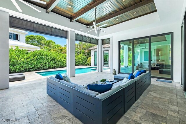 541 Whispering Pine Ct, Naples, FL 34103 - view of patio / terrace with an outdoor living space, a ceiling fan, and an outdoor pool