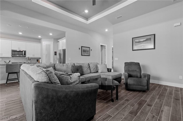 1806 SW 17th St, Cape Coral, FL 33991 - living room with dark wood-type flooring, recessed lighting, and baseboards