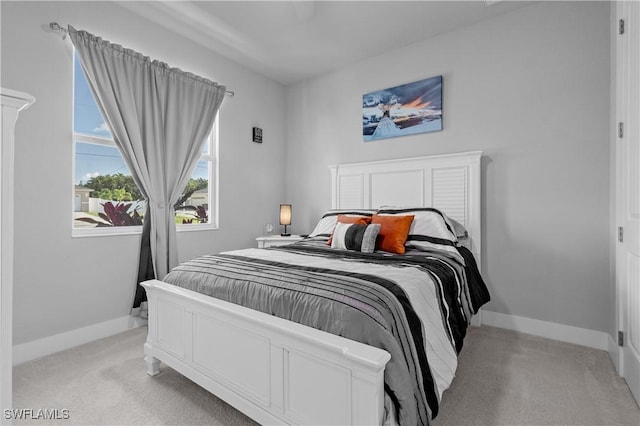 1806 SW 17th St, Cape Coral, FL 33991 - bedroom featuring light colored carpet and baseboards
