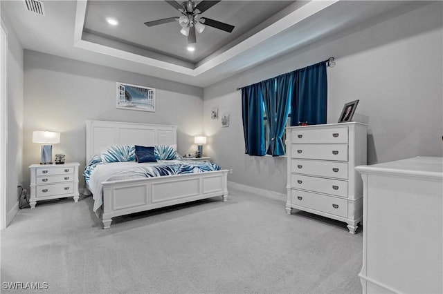 1806 SW 17th St, Cape Coral, FL 33991 - bedroom with light colored carpet, baseboards, recessed lighting, a ceiling fan, and a raised ceiling