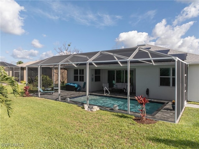 1806 SW 17th St, Cape Coral, FL 33991 - rear view of property featuring a lanai, a yard, a patio area, and stucco siding