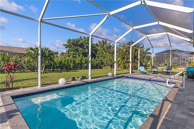 1806 SW 17th St, Cape Coral, FL 33991 - outdoor pool featuring a lawn, a patio area, and glass enclosure