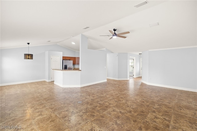 unfurnished living room featuring lofted ceiling, a ceiling fan, and baseboards