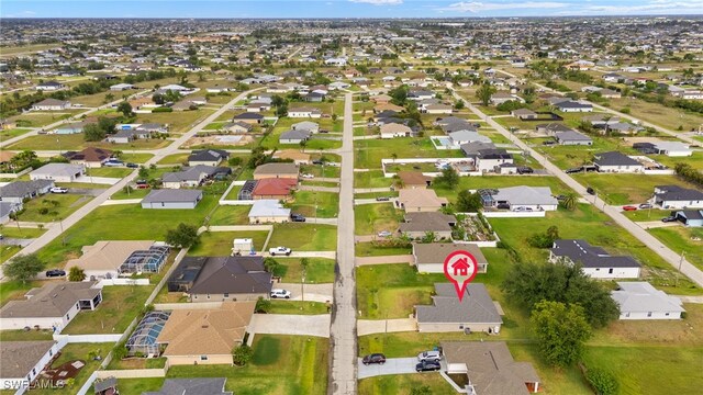 aerial overview of property's location featuring nearby suburban area